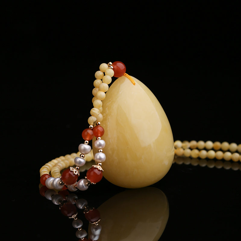 绣花张 满蜜飘花水滴蜜蜡吊坠