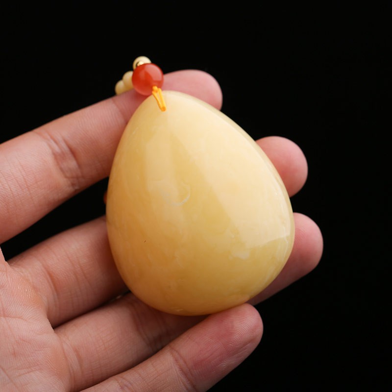 绣花张 满蜜飘花水滴蜜蜡吊坠