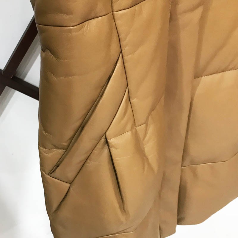 绵羊皮狐狸毛领皮羽绒服姜糖色